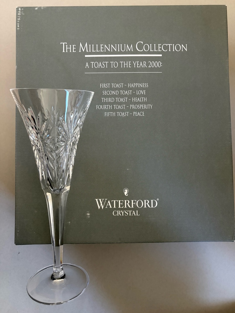 Waterford Crystal Millennium Collection Health fluted champagne glass.